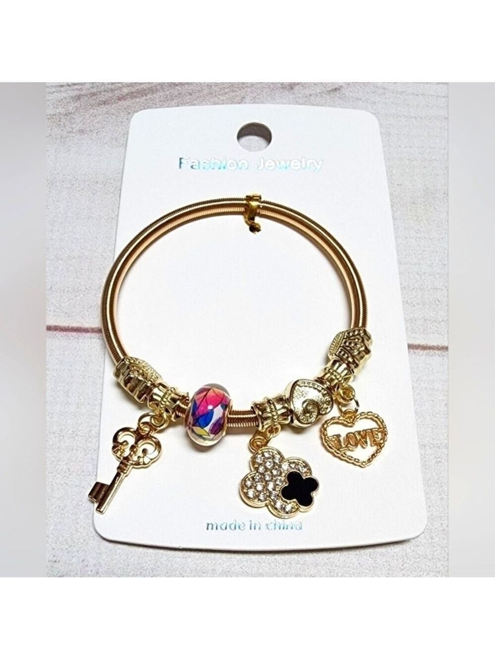 New Gold Sliding Charm Spring Bracelet